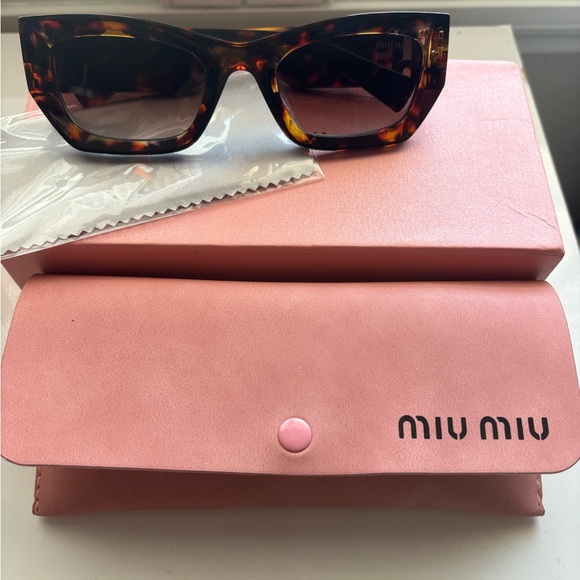 Miu Miu Sunglasses - Picture 1 of 3